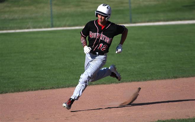 Wauwatosa East’s Dan Scallon rounds the bases after hitting a triple against Menomonee Falls on July 5. East upset Falls.